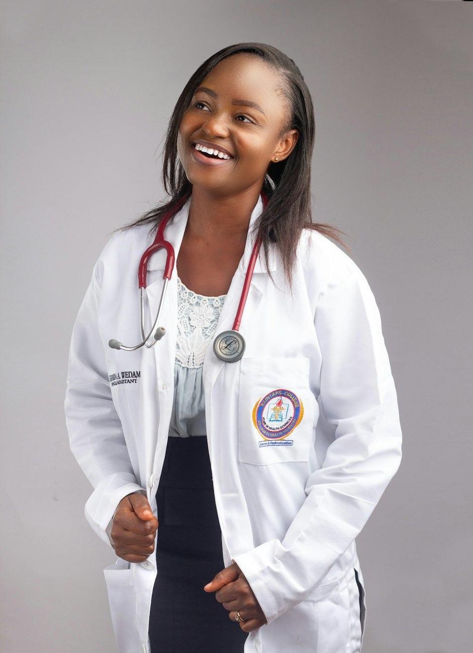 A smiling doctor in a white coat