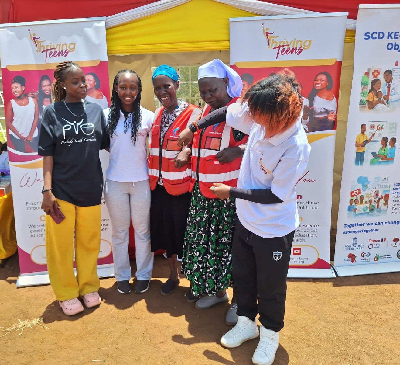 Thriving Teens volunteers working with community health partners